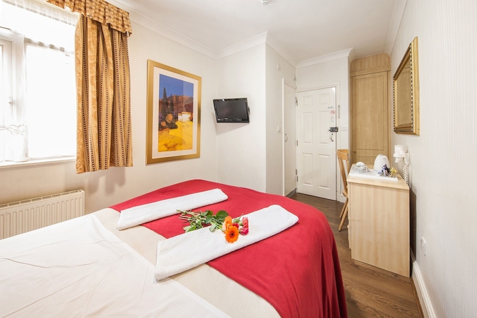 Imagen de la habitación del Hotel The Fairway. Foto 9