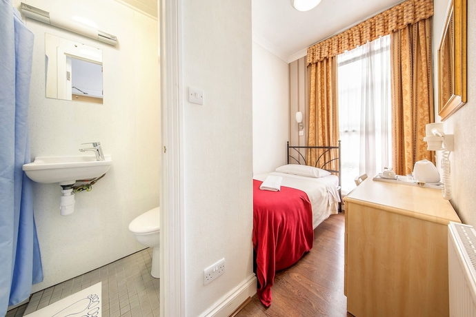 Imagen de la habitación del Hotel The Fairway. Foto 12