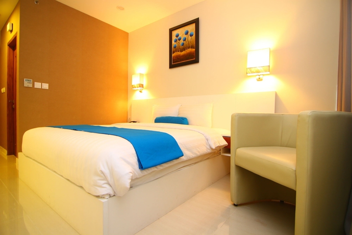 Imagen de la habitación del Hotel The Falatehan. Foto 4