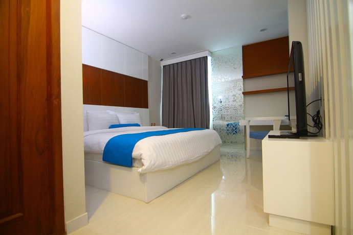 Imagen de la habitación del Hotel The Falatehan. Foto 5