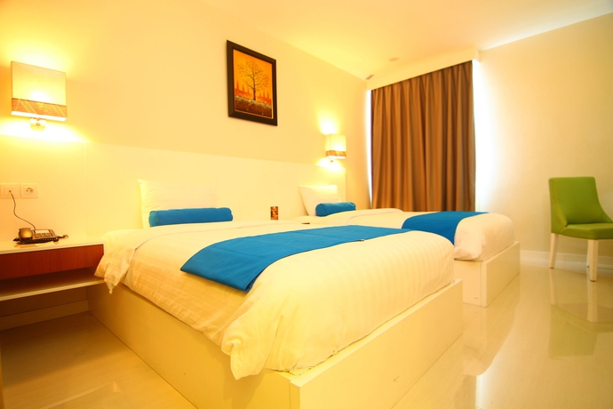 Imagen de la habitación del Hotel The Falatehan. Foto 6