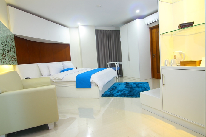 Imagen de la habitación del Hotel The Falatehan. Foto 8