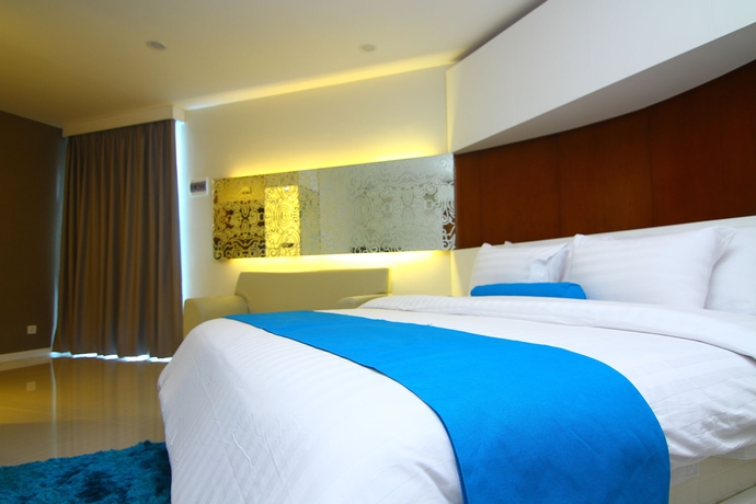 Imagen de la habitación del Hotel The Falatehan. Foto 9