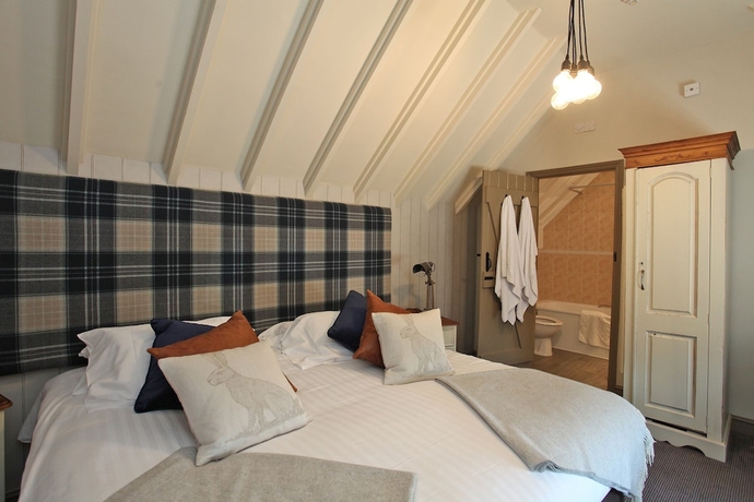 Imagen de la habitación del Hotel The Falcon Inn. Foto 10