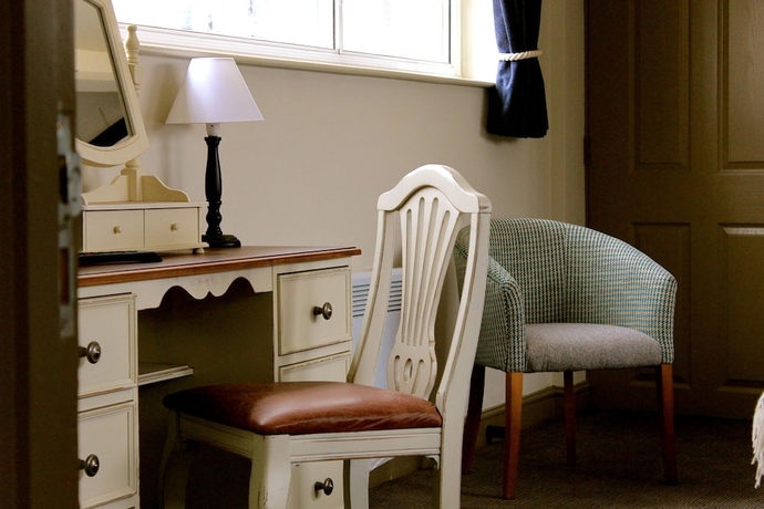 Imagen de la habitación del Hotel The Falcon Inn. Foto 12