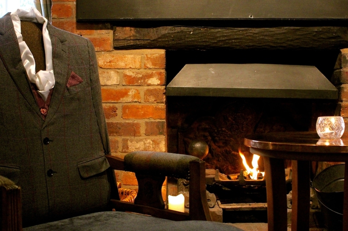 Imagen del bar/restaurante del Hotel The Falcon Inn. Foto 7