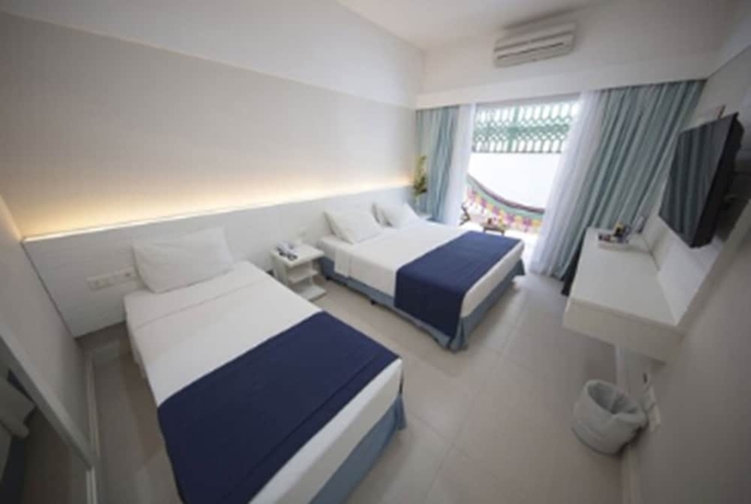Imagen de la habitación del Hotel The Falls, Guaruja. Foto 4