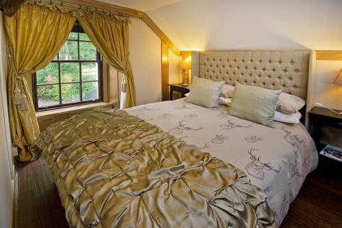 Imagen de la habitación del Hotel The Falls Of Dochart Inn. Foto 2