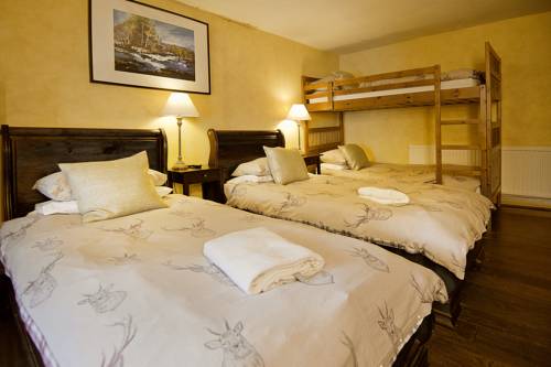 Imagen de la habitación del Hotel The Falls Of Dochart Inn. Foto 4