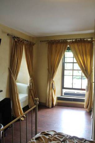 Imagen de la habitación del Hotel The Falls Of Dochart Inn. Foto 13