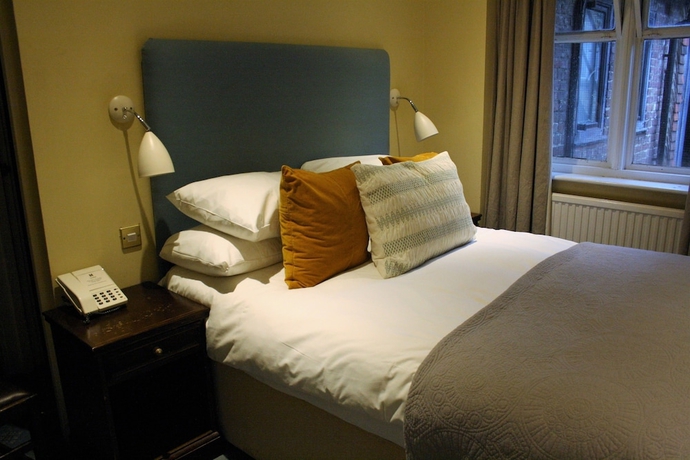 Imagen de la habitación del Hotel The Falstaff. Foto 4