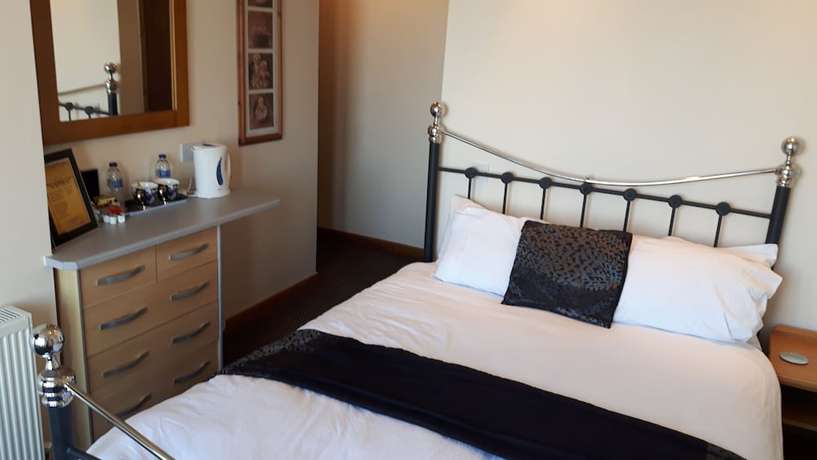 Imagen de la habitación del Hotel The Fame. Foto 19