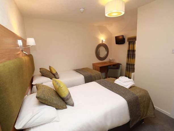 Imagen de la habitación del Hotel The Famous Star. Foto 6