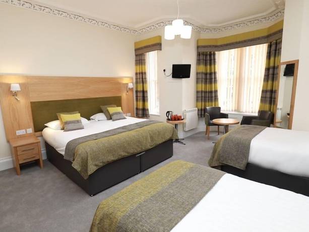 Imagen de la habitación del Hotel The Famous Star. Foto 8