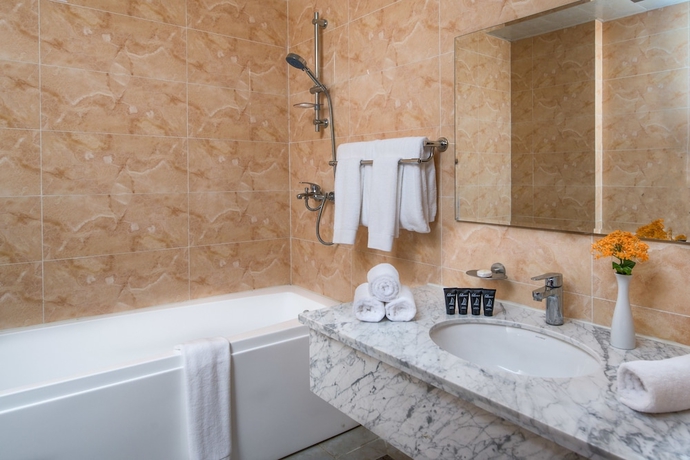 Imagen de la habitación del Hotel The Farmington. Foto 13