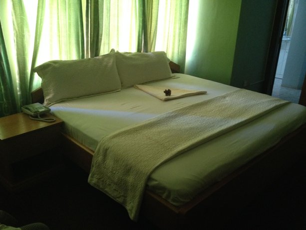 Imagen de la habitación del Hotel The Father\'s. Foto 14