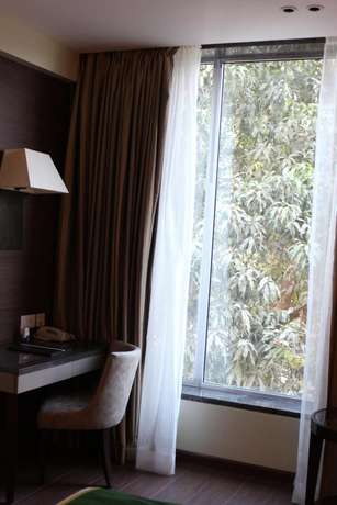 Imagen de la habitación del Hotel The Fern - An Ecotel, Vadodara. Foto 12