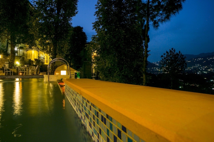 Imagen de la piscina del Hotel The Fern Hillside Resort Bhimtal. Foto 14