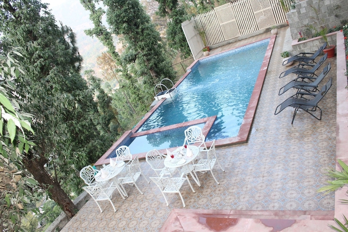 Imagen de la piscina del Hotel The Fern Hillside Resort Bhimtal. Foto 16