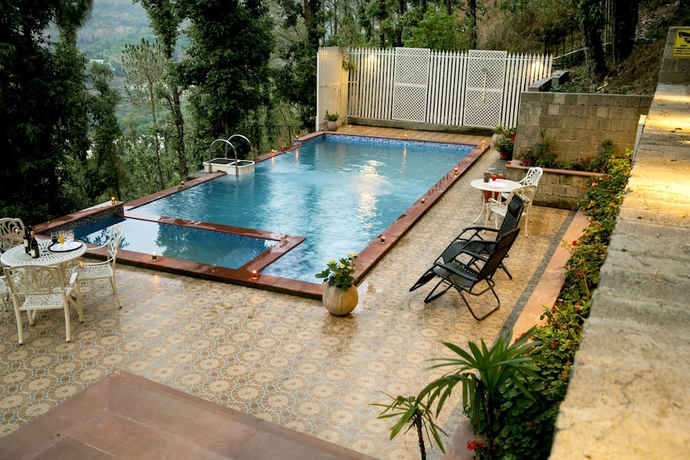 Imagen de la piscina del Hotel The Fern Hillside Resort Bhimtal. Foto 17