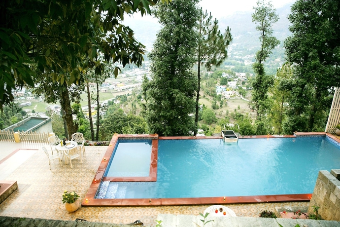 Imagen de la piscina del Hotel The Fern Hillside Resort Bhimtal. Foto 18
