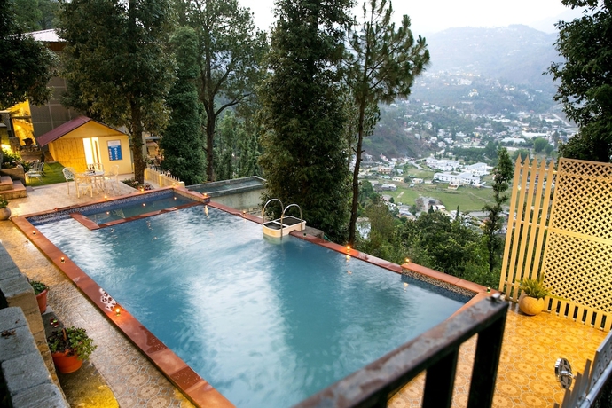 Imagen de la piscina del Hotel The Fern Hillside Resort Bhimtal. Foto 19