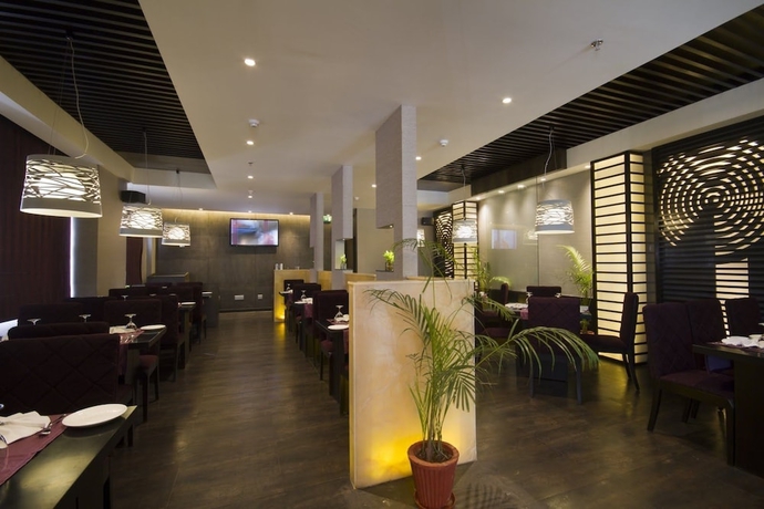 Imagen del bar/restaurante del Hotel The Fern Residency Chandigarh. Foto 4