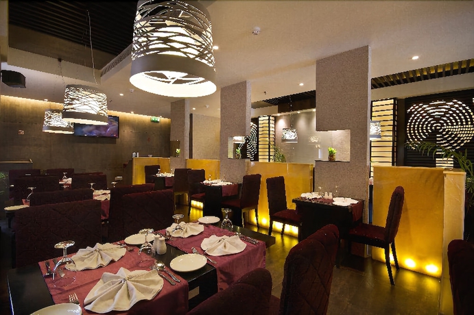 Imagen del bar/restaurante del Hotel The Fern Residency Chandigarh. Foto 5