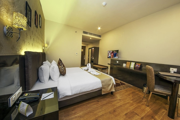 Imagen de la habitación del Hotel The Fern Residency Kolkata. Foto 2