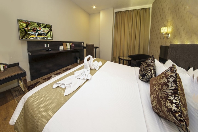 Imagen de la habitación del Hotel The Fern Residency Kolkata. Foto 8