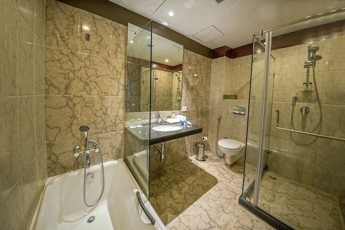 Imagen de la habitación del Hotel The Fern Residency Kolkata. Foto 15