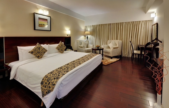 Imagen de la habitación del Hotel The Fern Residency Rajkot. Foto 9