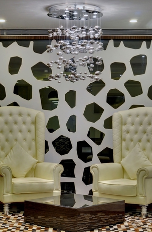 Imagen de los interiores del Hotel The Fern Residency Rajkot. Foto 18