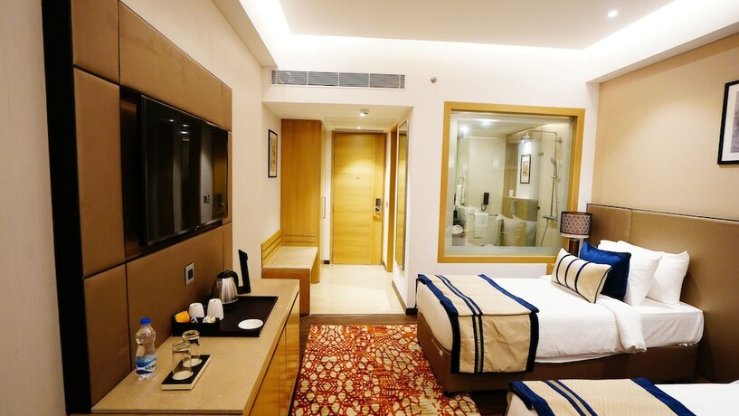 Imagen de la habitación del Hotel The Fern Residency Sarnath. Foto 16