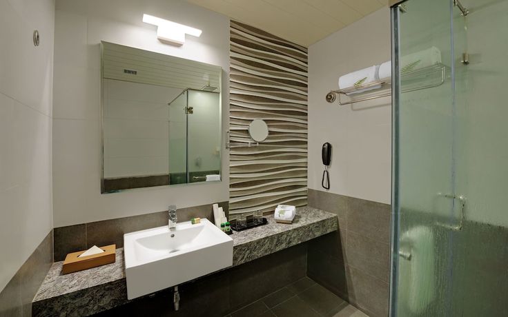 Imagen de la habitación del Hotel The Fern Residency Somnath. Foto 8