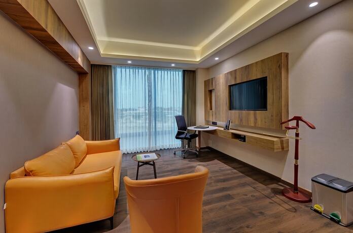 Imagen de la habitación del Hotel The Fern Royal Farm Resort Anjar. Foto 14