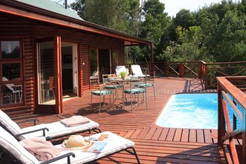 Imagen de la habitación del Hotel The Fernery Lodge & Chalets. Foto 10