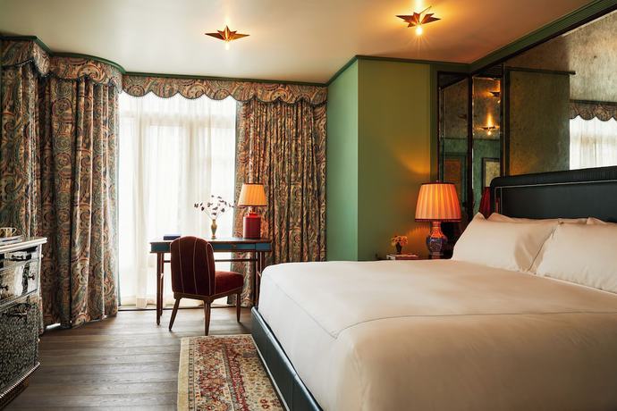 Imagen de la habitación del Hotel The Fifth Avenue. Foto 18