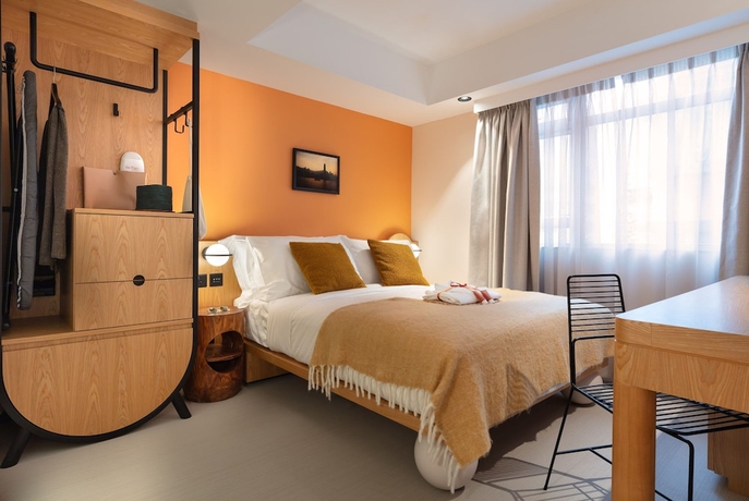 Imagen de la habitación del Hotel The Figo. Foto 4