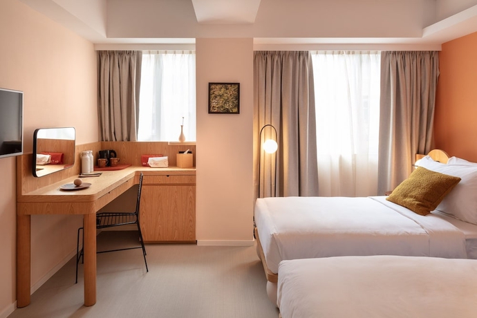 Imagen de la habitación del Hotel The Figo. Foto 8