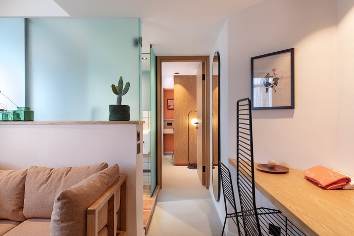 Imagen de la habitación del Hotel The Figo. Foto 11