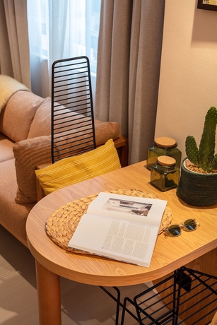 Imagen de la habitación del Hotel The Figo. Foto 14