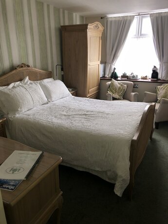 Imagen de la habitación del Hotel The Firs Guesthouse. Foto 17