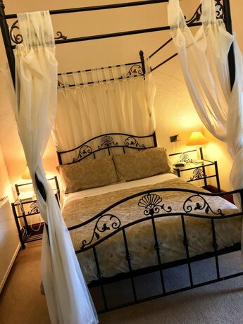 Imagen de la habitación del Hotel The Firs Guesthouse. Foto 20
