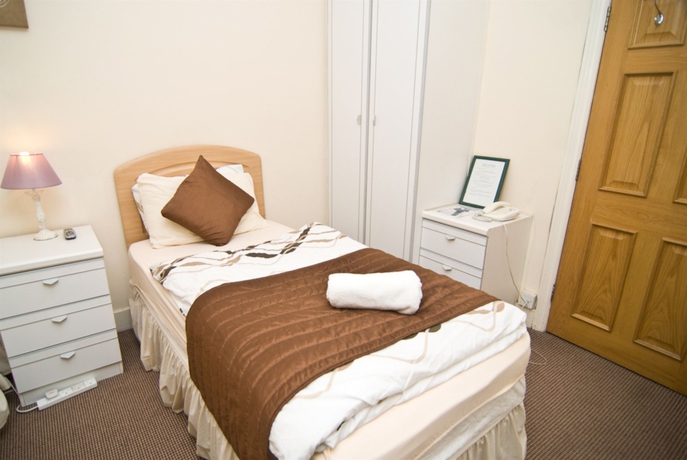 Imagen de la habitación del Hotel The Firs Lodge. Foto 4