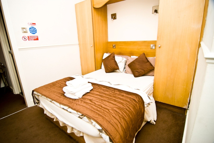 Imagen de la habitación del Hotel The Firs Lodge. Foto 5