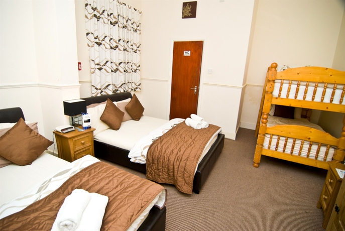 Imagen de la habitación del Hotel The Firs Lodge. Foto 6