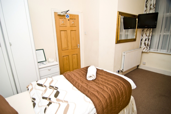 Imagen de la habitación del Hotel The Firs Lodge. Foto 8