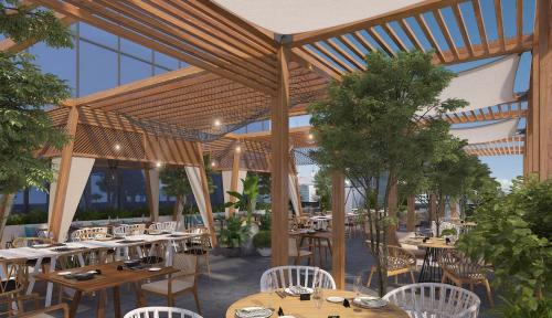 Imagen del bar/restaurante del Hotel The First Collection at Jumeirah Village Circle. Foto 3