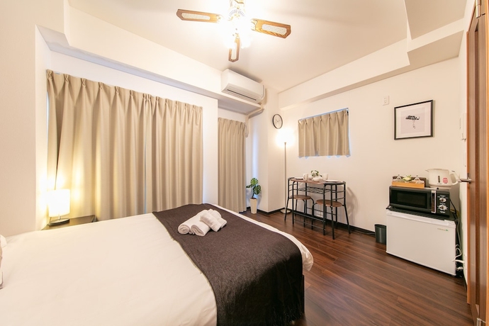 Imagen de la habitación del Hotel The First Shin-Osaka. Foto 11